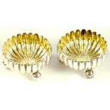 A PAIR OF VICTORIAN SILVER REEDED SALT CELLARS, BIRMINGHAM 1882, 1OZ