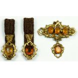 A PAIR OF VICTORIAN CITRINE SET GOLD AND PLAITED HAIR MOURNING BRACELETS AND A CONTEMPORARY BROOCH