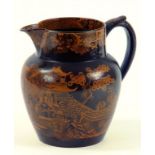 AN EARLY 19TH CENTURY BROWN GLAZED PEARLWARE JUG, WITH OCHRE CHINESE TRANSFER PRINTS