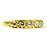 A DIAMOND FIVE STONE RING IN GOLD, 3.5G