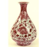 A CHINESE UNDERGLAZE RED DECORATED PORCELAIN VASE, PAINTED WITH PEONIES IN MING STYLE