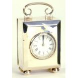 A GEORGE V SILVER CARRIAGE CLOCK WITH FRENCH TIMEPIECE, THE CASE OF CHAMFERED DESIGN, BIRMINGHAM