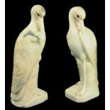 A PAIR OF CARVED ALABASTER BIRD BOOKENDS