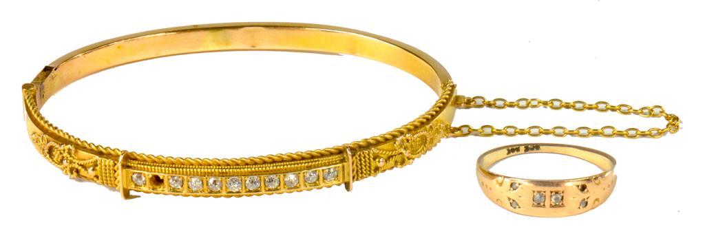 A DIAMOND BRACELET IN GOLD, MARKED 15 (ONE DIAMOND DEFICIENT) AND A DIAMOND GYPSY SET RING IN