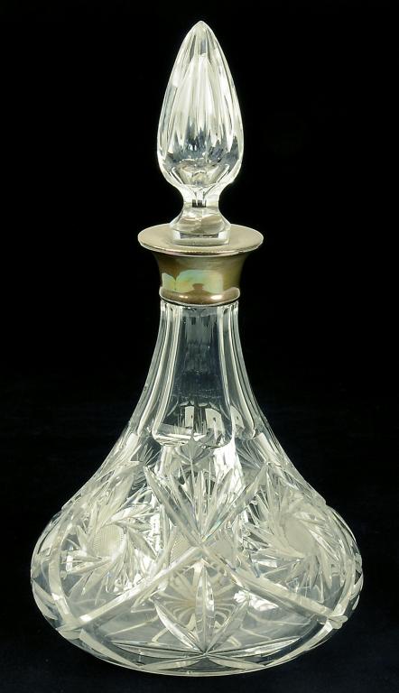 AN ELIZABETH II SILVER MOUNTED CUT GLASS SHIP'S DECANTER AND STOPPER, LONDON 1989