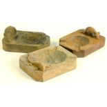 TWO MOUSEMAN CARVED OAK ASHTRAYS BY ROBERT THOMPSON OF KILBURN AND ANOTHER, CARVED WITH A REPTILE