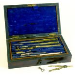 A SET OF VICTORIAN BRASS DRAUGHTSMAN'S INSTRUMENTS IN ROSEWOOD CASE