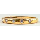 A DIAMOND FIVE STONE RING IN 18CT GOLD, 1.7G