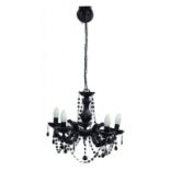 A BLACK GLASS CHANDELIER