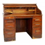 AN OAK DESK WITH TAMBOUR SHUTTER, EARLY 20TH C