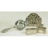 AN ELIZABETH II SILVER TEA STRAINER, BIRMINGHAM 1963, A PAIR OF SILVER NAPKIN RINGS OF HEAVY GAUGE