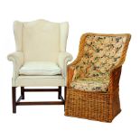 A GEORGE III STYLE WING CHAIR AND AND WICKER CHAIR