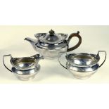 A GEORGE III SILVER THREE PIECE TEA SERVICE, CRESTED, LONDON 1801 AND 1802, 35OZS GROSS