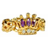 AN AMETHYST AND DIAMOND SET GOLD PIERCED RING OF CROWN DESIGN, MARKED 14KT 585, 6.2G