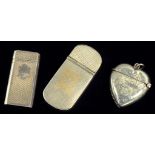 A GEORGE V SILVER HEART SHAPED VESTA CASE, CHESTER 1910 AND TWO OTHER SILVER VESTA CASES