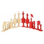 AN ENGLISH IVORY 'BARLEYCORN' CHESS SET, MID 19TH C stained red or natural, kings 13cm h (32) ++In