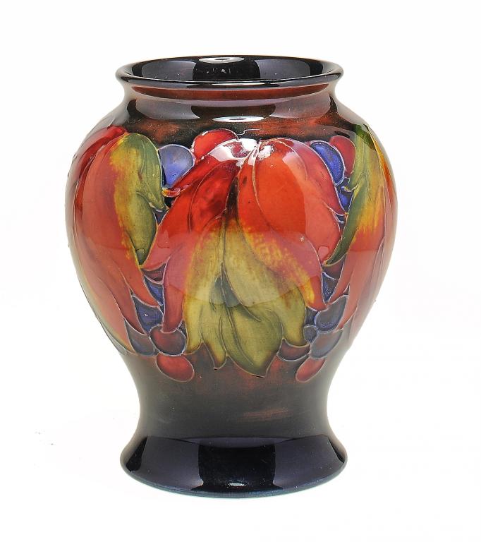 A MOORCROFT FLAMBÉ LEAF AND BERRY VASE DESIGNED BY WILLIAM MOORCROFT,  C1945-9  14.5cm h,