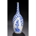 A JAPANESE ARITA SLENDER BLUE AND WHITE BOTTLE, 18TH C 23cm h, with early silver mounted cork