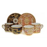 A NEW HALL COBALT GROUND TRIO, PATTERN 538, C1800 AND A SPODE TRIO, C1805-10  saucers 13.5cm