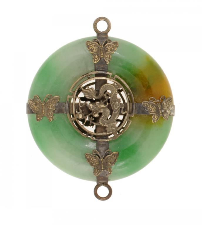 A CHINESE SILVERED BRASS MOUNTED JADEITE BI-DISC, EARLY 20TH C with dragon and moth mounts to both