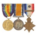 WORLD WAR ONE GROUP OF THREE  1914 Star with 5th Aug - 22nd Nov  1914 clasp and silver rosette,