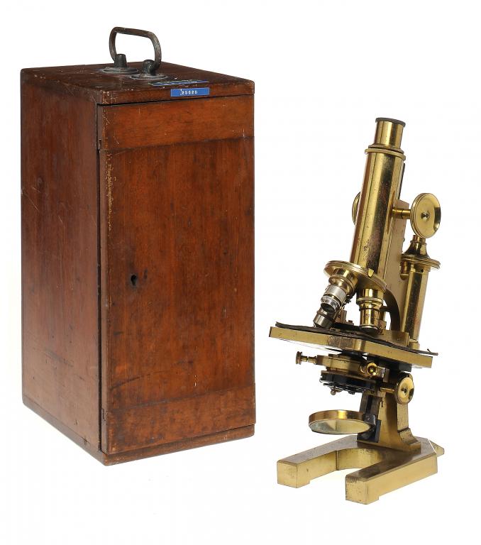 A BRASS MICROSCOPE BY R & J BECK LTD  NO 25620  with triple objective turret, substage condenser and