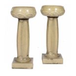 A PAIR OF LEEDS FIRECLAY CO LEFCO WARE GARDEN VASES AND PEDESTALS, IN THE MANNER OF ARCHIBALD