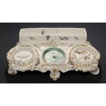 A RARE DERBY ROCOCO INKSTAND, C1765 enamelled with insects, 24.5cm w For the example in the Victoria