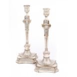 A PAIR OF OLD SHEFFIELD PLATE NEO CLASSICAL STYLE CANDLESTICKS BY BOULTON & FOTHERGILL, C1775