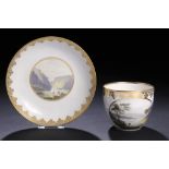 A DERBY TEACUP AND SAUCER, C1790 painted by Zachariah Boreman with landscapes, saucer 13.5cm diam,