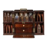 A VICTORIAN MAHOGANY DOMESTIC MEDICINE CABINET, C1860 with sliding compartment at the back and