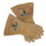 A PAIR OF NATIVE AMERICAN SUEDE AND BEADWORK GLOVES, EARLY-MID 20TH C 30cm l ++Some soiling but in