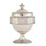 AN OLD SHEFFIELD PLATE VASE SHAPED TEA CADDY, C1790 with engraved silver band to the twelve sided