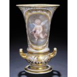 A DERBY FLARED VASE, C1815  painted with an oval panel of Putto on a Cloud, the reverse with emblems