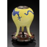 A JAPANESE PORCELAIN KORO BY MAKUZU KOZAN, MEIJI  painted in underglaze blue with a dragon on  lemon