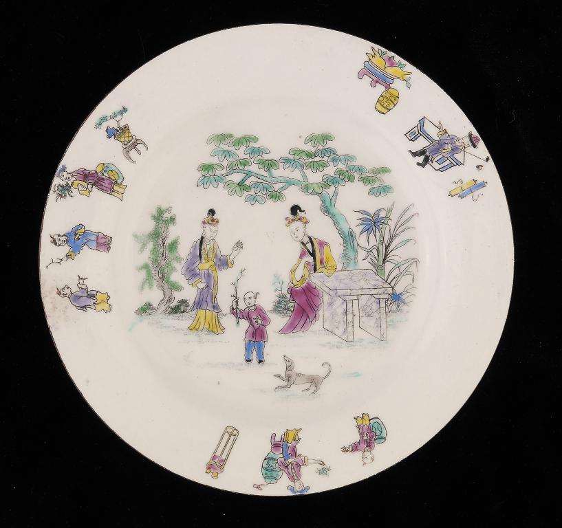 A BOW PLATE, C1765-68  outline printed in black and enamelled with Chinese figures, 20.5cm diam ++In