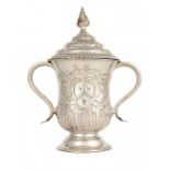 AN EARLY OLD SHEFFIELD PLATE TWO HANDLED AND CHASED CUP AND COVER BY TUDOR & CO, C1765  one side