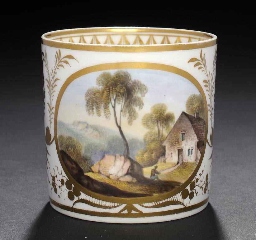 A DERBY COFFEE CAN, C1820 painted with an oval landscape panel, wishbone handle, 6.5cm h, painted