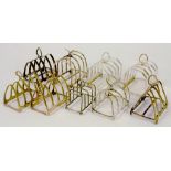 NINE SILVER FIVE HOOP TOAST RACKS, INCLUDING SEVERAL PAIRS, VARIOUS MAKERS AND DATES, 17OZS