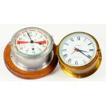 A SESTREL PLATED BRASS SHIPS CLOCK WITH RED AND WHITE DIAL AND A SMITHS BRASS QUARTZ MARINE CLOCK,