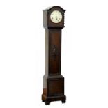 A DARK STAINED OAK DWARF LONGCASE CLOCK, THE THREE TRAIN MOVEMENT WITH SILVERED DIAL INSCRIBED