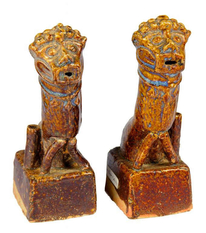 A PAIR OF CHINESE FLAMBÉ GLAZED EARTHENWARE DOG OF FO JOSS STICK HOLDERS, MING DYNASTY, 16/17TH C