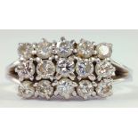 A DIAMOND CLUSTER RING IN 18CT WHITE GOLD, 6.3G GROSS
