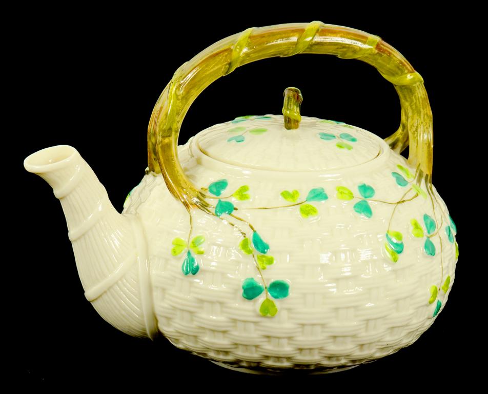 A BELLEEK SHAMROCK KETTLE AND COVER