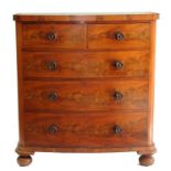 A VICTORIAN MAHOGANY BOW FRONTED CHEST OF DRAWERS