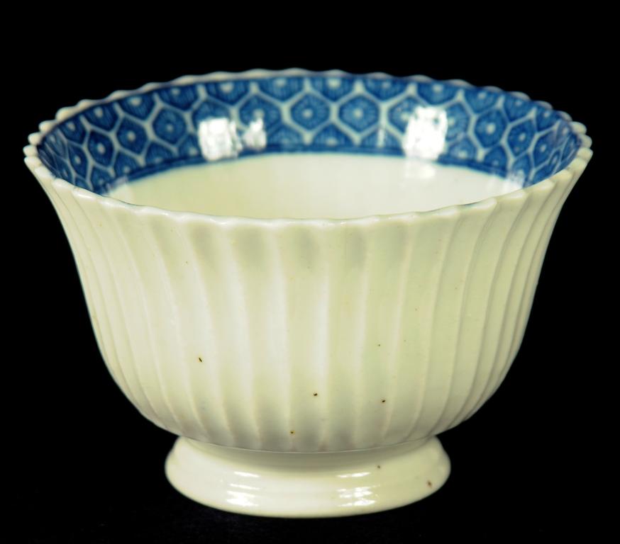 A CAUGHLEY FLUTED TEA BOWL, C1789-90  7.5cm diam, printed C (ex R Marsh Collection) ++ In fine