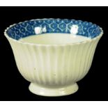 A CAUGHLEY FLUTED TEA BOWL, C1789-90  7.5cm diam, printed C (ex R Marsh Collection) ++ In fine