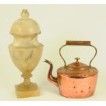 A VICTORIAN COPPER KETTLE AND AN ALABASTER LAMP IN THE FORM OF SHIELD SHAPED VASE AND COVER