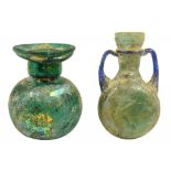 TWO ROMAN GLASS BOTTLES, ONE A SPRINKLER, 3RD-4TH CENTURY AD  the other with applied blue handles,