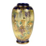 A JAPANESE SATSUMA WARE BLUE GROUND VASE, MEIJI  enamelled to either side with garden scenes and